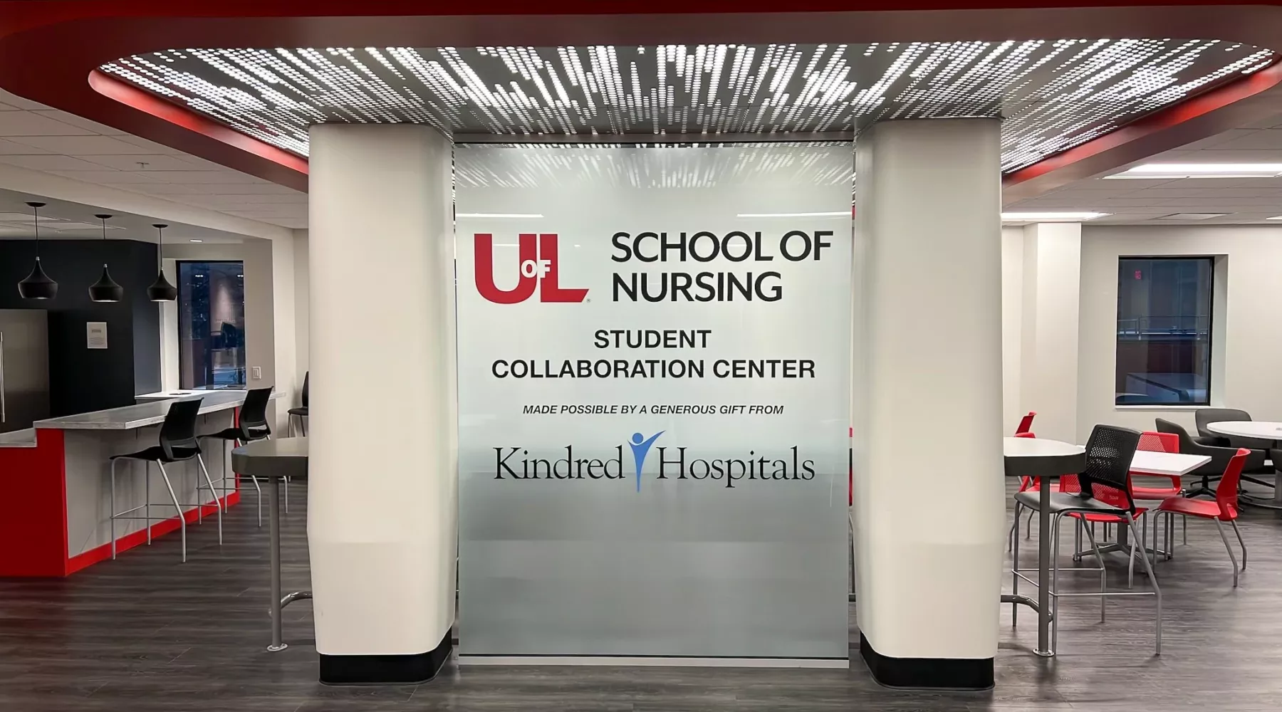 Wall graphic at the entrance to the Student Collaboration Center with the text School of Nursing Student Collaboration Center made possible by a generous gift from Kindred Hospitals
