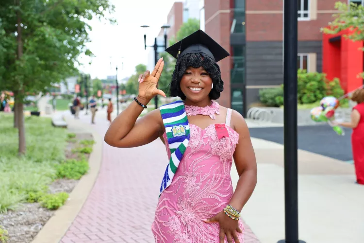 University of Louisville School of Nursing Accelerated BSN graduate, Lealye Kamara class of '25 smiles at the camera with…