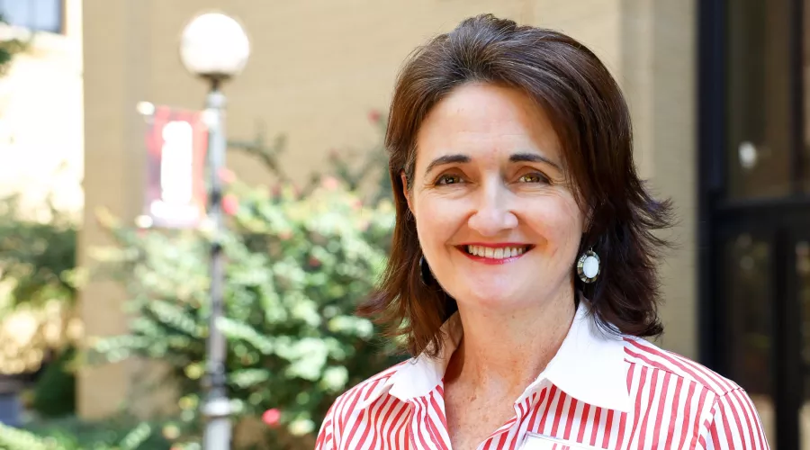 University of Louisville School of Nursing Faculty member, Dr. Imelda Wright poses for a photo on HSC Campus outside on a…
