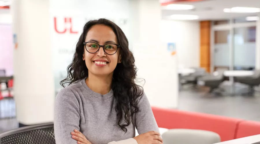 University of Louisville School of Nursing PhD Student, Shubha Sapkota, inside the School of Nursing building.