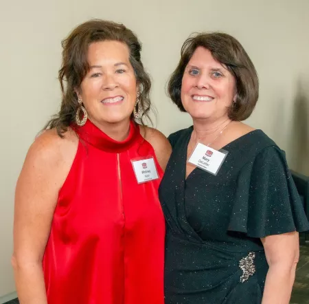 School of Nursing Interim Dean Mary DeLetter, right, standing next to incoming dean Whitney Nash at the School of Nursing 50th anniversary event.